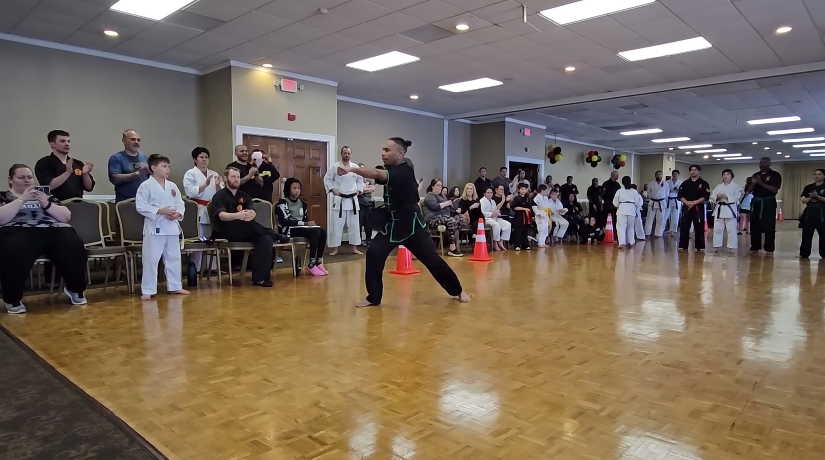 Students and families around the floor at a tournament