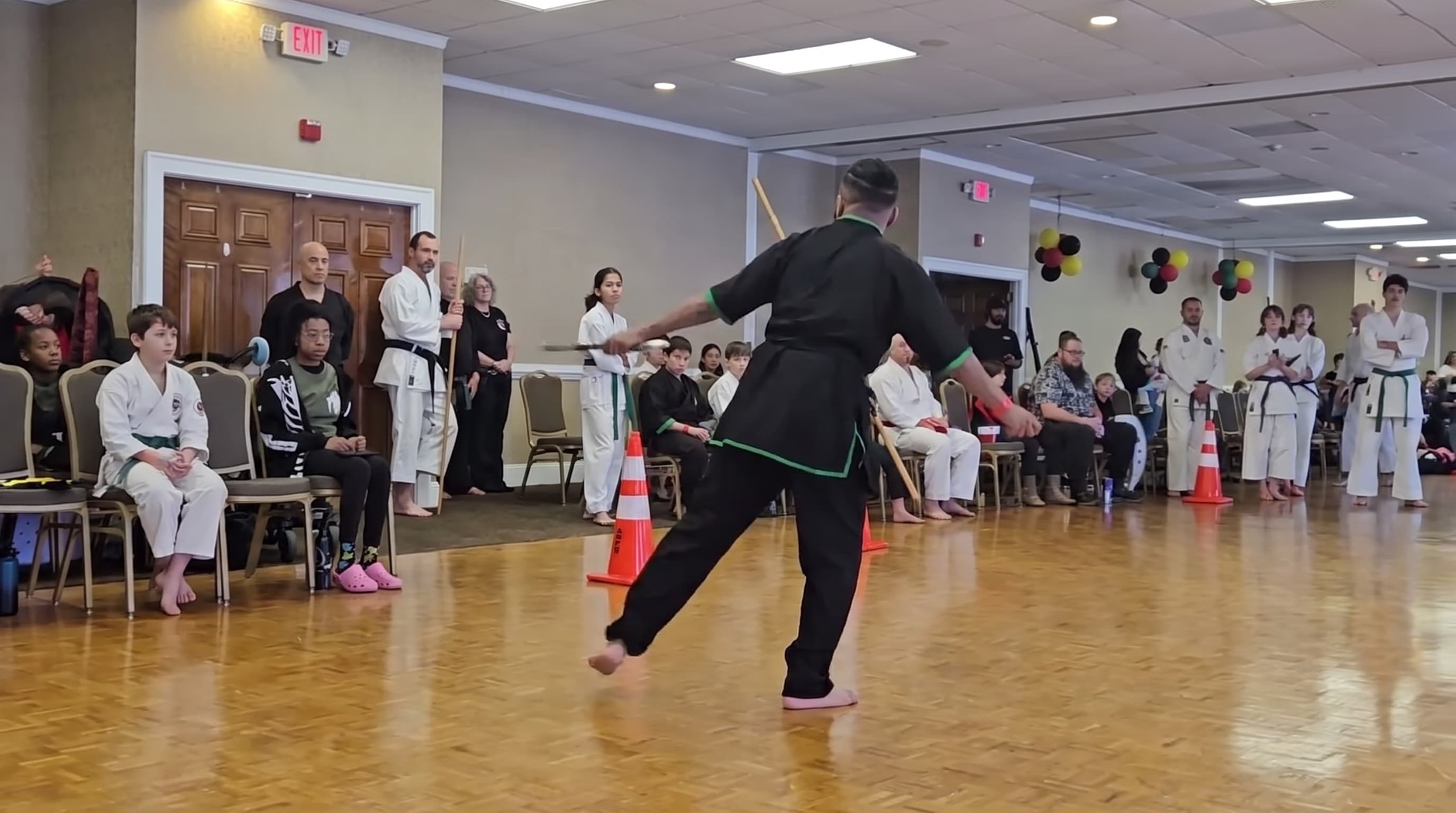 A kung fu form on the wood floor